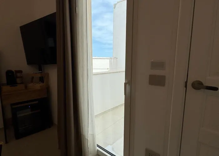 Chilometro Mille E ゲストハウス 3*